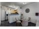 Kitchen and dining area with glass table and four chairs at 711 Centervale Dr # 711, Celebration, FL 34747