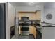 Modern kitchen with stainless steel appliances and granite countertops at 711 Centervale Dr # 711, Celebration, FL 34747