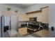 Modern kitchen with stainless steel appliances and granite countertops at 711 Centervale Dr # 711, Celebration, FL 34747