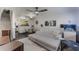 Open living area with sectional sofa and adjacent kitchen at 711 Centervale Dr # 711, Celebration, FL 34747