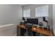Home office with a large desk and ergonomic chair at 711 Centervale Dr # 711, Celebration, FL 34747