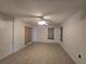 Bright living room with tile floors and ceiling fan at 770 Mink Ct, Poinciana, FL 34759