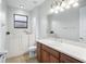 Bathroom with walk-in shower and single vanity at 800 Ebb Tide Ln, Kissimmee, FL 34759