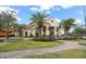 Community clubhouse with inviting entryway at 800 Ebb Tide Ln, Kissimmee, FL 34759
