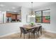 Elegant dining room with a wood table and gray chairs at 800 Ebb Tide Ln, Kissimmee, FL 34759