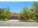 Charming single-story home featuring a well-maintained lawn and attached two-car garage at 800 Ebb Tide Ln, Kissimmee, FL 34759