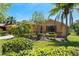 Beautiful single-story home with decorative stone, landscaping, and a well-manicured lawn at 800 Ebb Tide Ln, Kissimmee, FL 34759