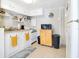 Small kitchen with white cabinets and a light blue stove at 805 Wingo St, Orlando, FL 32803