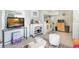 Bright living room with comfy seating and a kitchenette at 805 Wingo St, Orlando, FL 32803