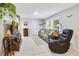 Relaxing living room with comfortable seating and large TV at 805 Wingo St, Orlando, FL 32803