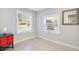 Cozy spare bedroom with a red cabinet and window at 805 Wingo St, Orlando, FL 32803