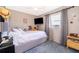 Bedroom with a full-size bed and blue carpet at 6655 Durango Ct, Orlando, FL 32809