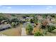 Aerial view of a house and surrounding property with spacious yard and trees at 10842 Sw 67Th Ave, Ocala, FL 34476
