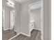 Bathroom with vanity, mirror, and access to another room at 10842 Sw 67Th Ave, Ocala, FL 34476