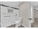 Bathroom with toilet and a large walk-in shower at 10842 Sw 67Th Ave, Ocala, FL 34476