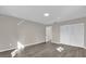 Spacious bedroom with large closet and wood-look floors at 10842 Sw 67Th Ave, Ocala, FL 34476