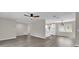 Modern kitchen with white cabinets, quartz countertops, and stainless steel appliances at 10842 Sw 67Th Ave, Ocala, FL 34476