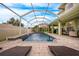 Relaxing pool area with screened enclosure and lounge chairs at 111 Vista Dr, Davenport, FL 33897