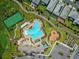 Community pool, tennis courts, playground, and garden at 11868 Pulitzer Pl, Orlando, FL 32832