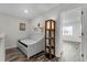 Small bedroom with daybed and built-in shelving at 11868 Pulitzer Pl, Orlando, FL 32832