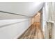 Finished attic with wood-look floors, closet, and storage space under eaves at 12788 Gillard Rd, Winter Garden, FL 34787