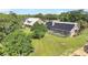 Home exterior with solar panels on the roof and a fenced in yard at 12788 Gillard Rd, Winter Garden, FL 34787