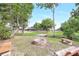A backyard features an attractive fire pit and seating area, perfect for outdoor enjoyment at 12788 Gillard Rd, Winter Garden, FL 34787