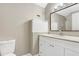 Bathroom featuring a modern vanity with a sink, a wall mirror, and tiled floors at 12788 Gillard Rd, Winter Garden, FL 34787