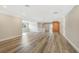 Bonus room with wood floors, natural lighting, and staircase at 12788 Gillard Rd, Winter Garden, FL 34787