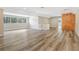 Bonus room with wood floors, natural lighting, and built in wood cabinet at 12788 Gillard Rd, Winter Garden, FL 34787