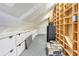Bonus room with carpet and ample storage, shelving, and white storage cabinets at 12788 Gillard Rd, Winter Garden, FL 34787