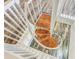 Unique staircase with spiral design and wood steps at 12788 Gillard Rd, Winter Garden, FL 34787