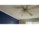 Blue-walled bedroom with a ceiling fan at 1450 Warrior Trl, Deltona, FL 32725