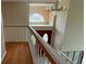Image of a staircase overlooking the entryway at 1450 Warrior Trl, Deltona, FL 32725