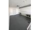 Spacious bedroom with gray walls and flooring, two closets and built-in shelves at 150 E Robinson St # 1411, Orlando, FL 32801
