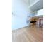 Open loft living area with spiral staircase and kitchen view at 150 E Robinson St # 1411, Orlando, FL 32801