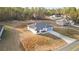 An aerial view captures the home's design and placement on a spacious lot at 15136 Sw 61St Court Rd, Ocala, FL 34473