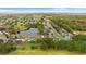 Community view showcasing a pond and surrounding homes at 15336 Firelight Dr, Winter Garden, FL 34787