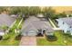 Aerial view showing house and nicely landscaped yard at 15336 Firelight Dr, Winter Garden, FL 34787