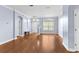 Hardwood floor living room with light walls and entryway at 15336 Firelight Dr, Winter Garden, FL 34787