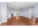 Open living area with hardwood floors and access to backyard at 15336 Firelight Dr, Winter Garden, FL 34787