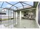 Enjoy outdoor dining in this screened patio area at 15336 Firelight Dr, Winter Garden, FL 34787