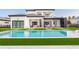 Modern two-story home with pool and expansive backyard at 16106 Pendio Dr, Bella Collina, FL 34756