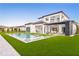 Stunning two-story home with a modern design and private pool at 16106 Pendio Dr, Bella Collina, FL 34756