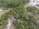 Wonderful view of the home site surrounded by lush forest and beautiful water features at 221 Se 125Th Terrace Rd, Silver Springs, FL 34488
