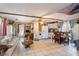 Cozy living space open to the kitchen, featuring tile floors and ample natural light at 221 Se 125Th Terrace Rd, Silver Springs, FL 34488