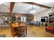 Spacious dining and living area showcasing a fireplace and wood floors at 221 Se 125Th Terrace Rd, Silver Springs, FL 34488