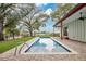 Relaxing rectangular pool with water view at 2606 Hoffner Ave, Belle Isle, FL 32809