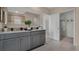Bathroom with double vanity and a walk-in shower at 2974 Salisbury Ave, Haines City, FL 33844