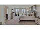 King-size bed in a well-lit bedroom with ensuite access at 2974 Salisbury Ave, Haines City, FL 33844